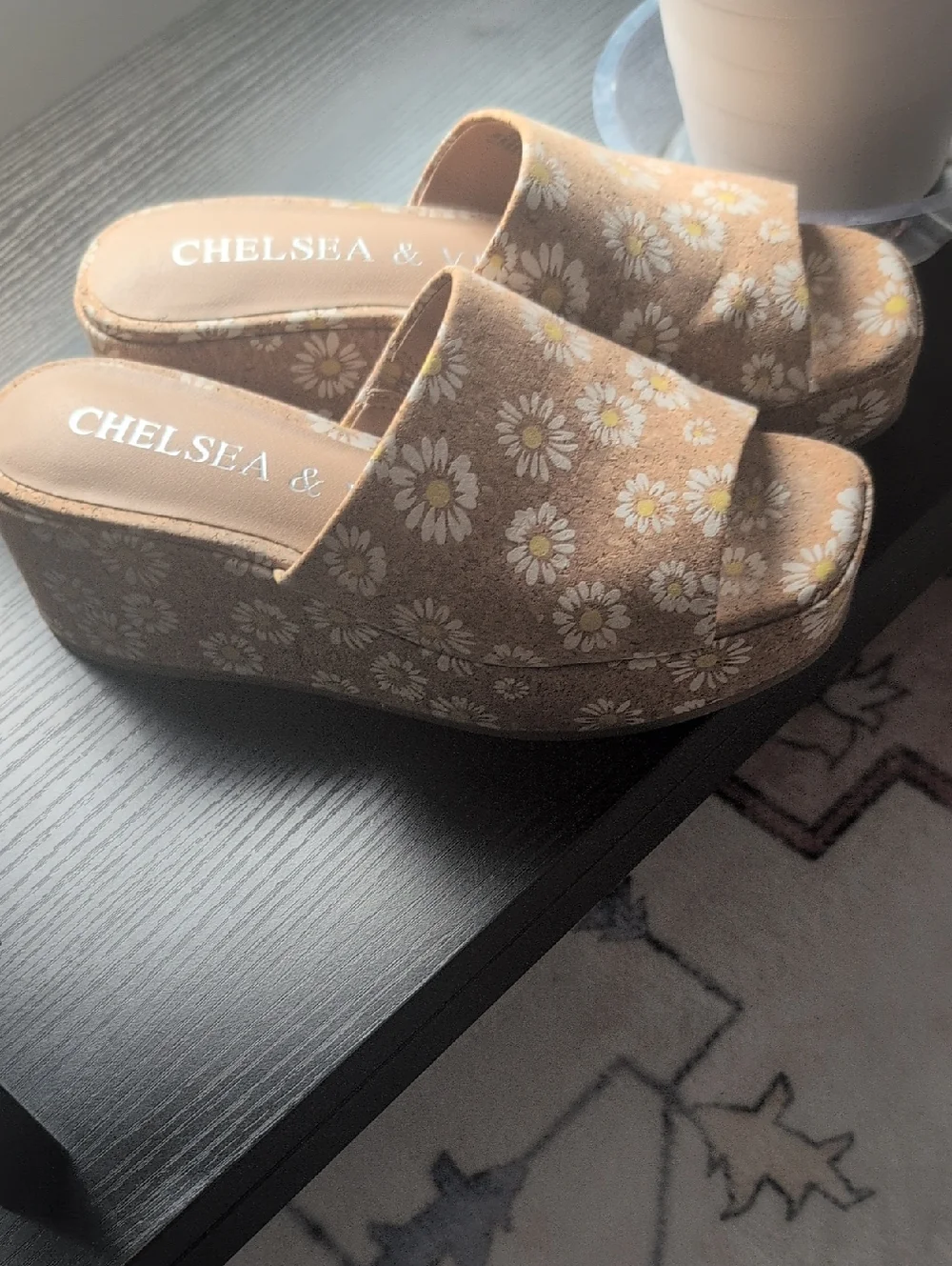 Chelsea & Violet daisy-patterned cork wedge heel.